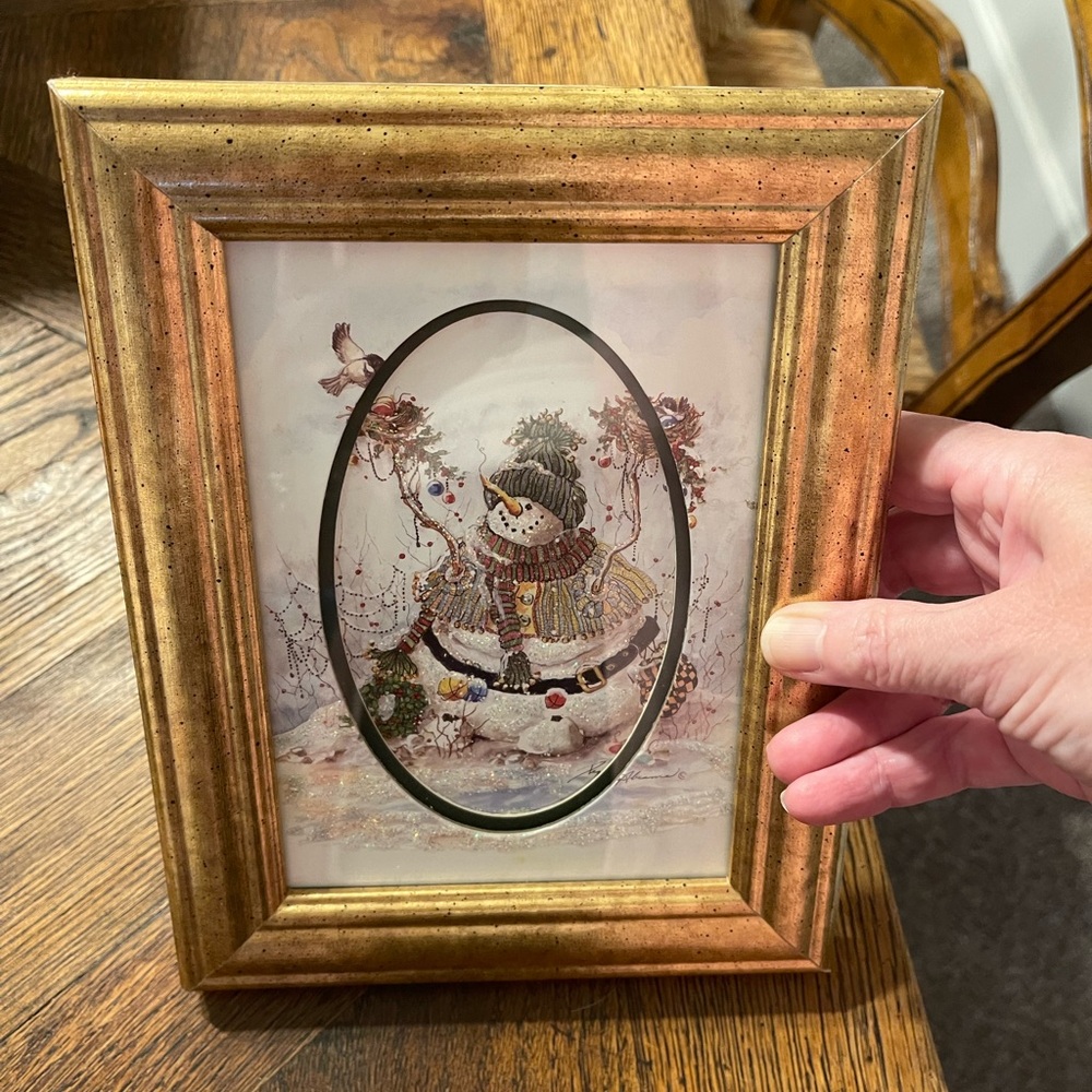 Peggy Abram’s Gold Framed Snowman Artwork